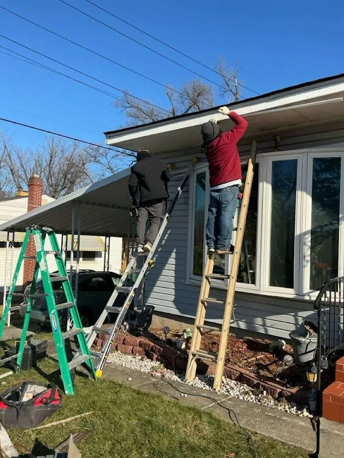 Restoration crew performing exterior repair in Barrington